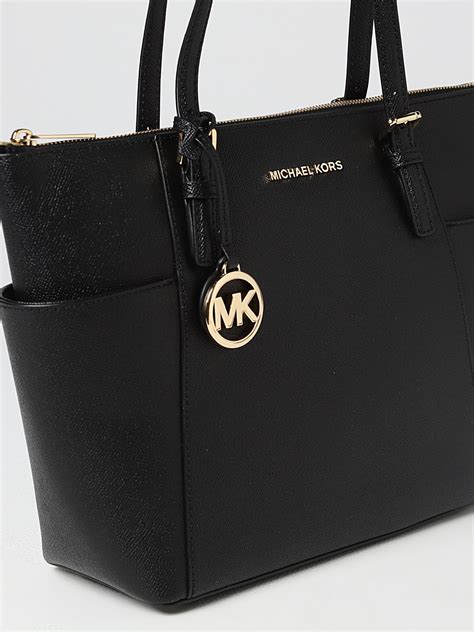 michael kors produktion|Michael Kors tragetasche.